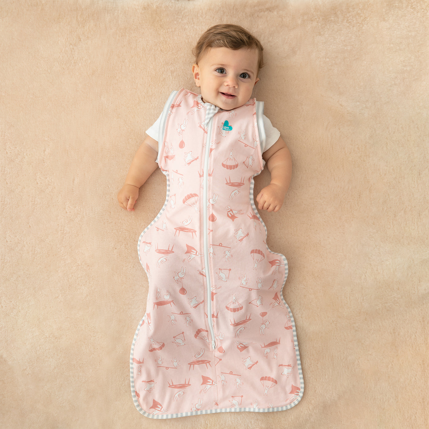 Swaddle Up™ Transition Bag Lite 0.2 TOG - Daredevil Bunny Pink