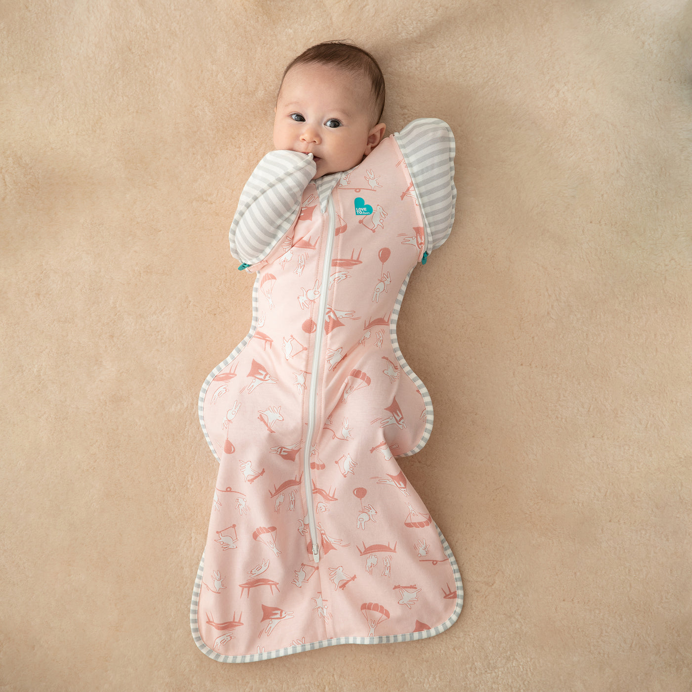 Swaddle Up™ Transition Bag Lite 0.2 TOG - Daredevil Bunny Pink